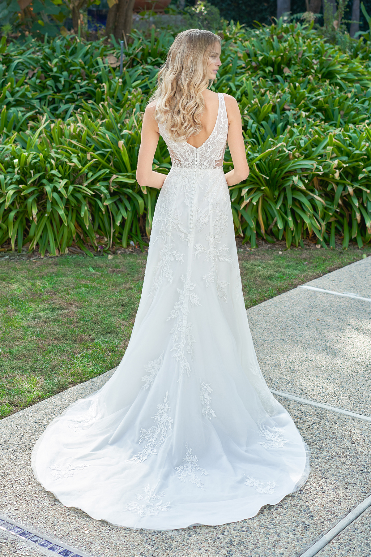 Deep V-neck off shoulder sleeveless lace floral patch backless and floor length wedding dress